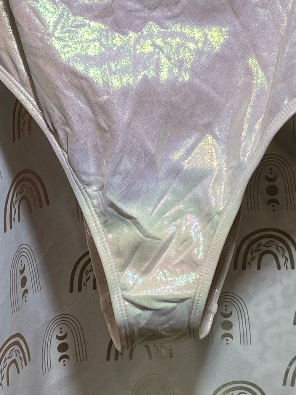 No Boundaries Iridescent Pastel One-Piece Bodysuit in Pearl Pink and Light Blue